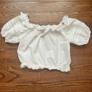 Cute white top with ruffled sleeves and collar